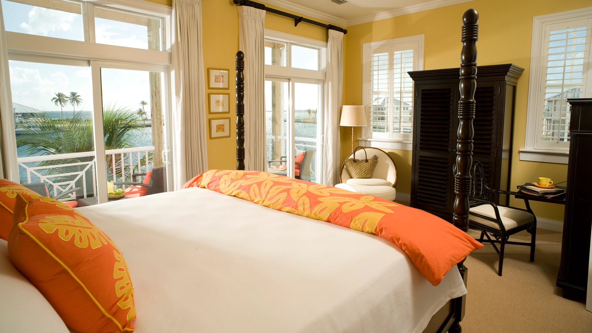 A bright island guest room with ocean views