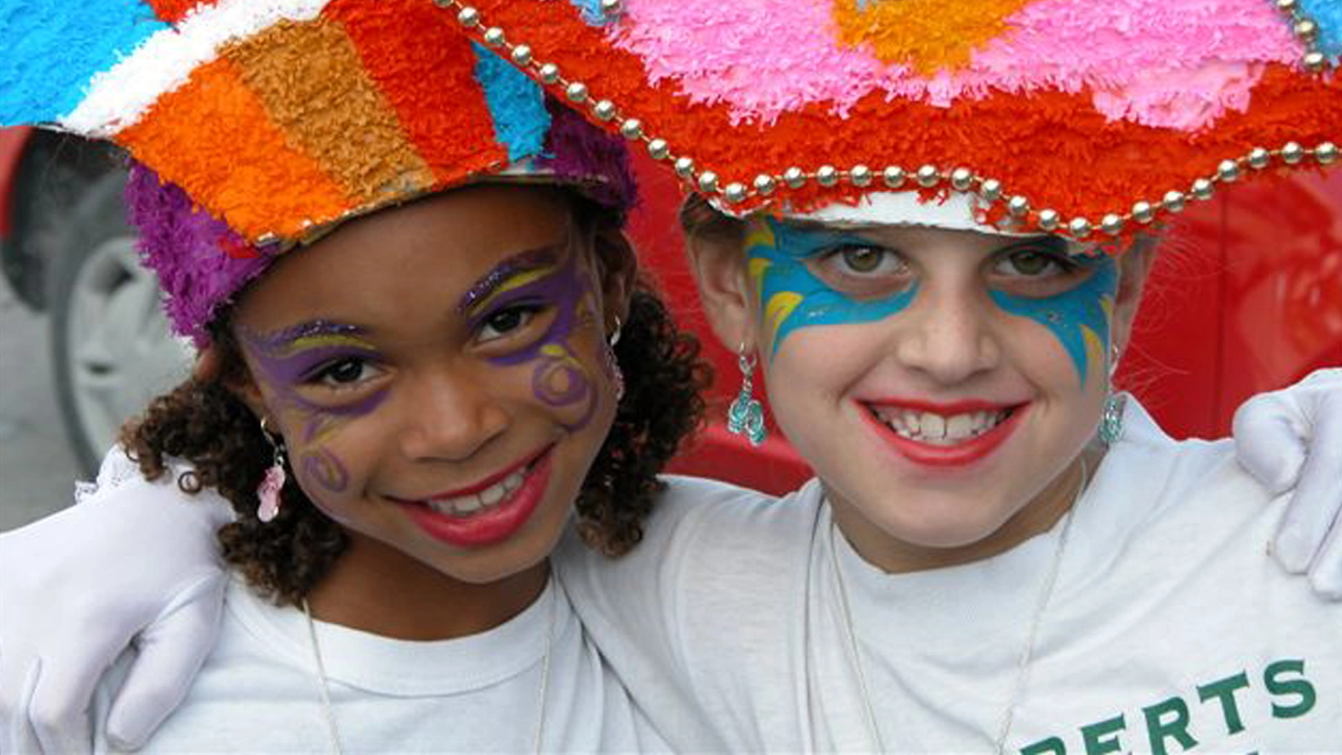 Children wearing colourful Junkanoo costumes